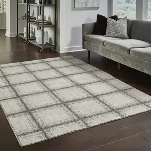 Photo of Grey Teal And Beige Geometric Power Loom Stain Resistant Area Rug
