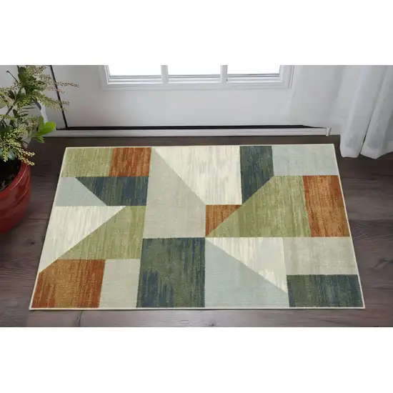 Grey Teal Blue Rust Green And Ivory Geometric Power Loom Stain Resistant Area Rug Photo 1