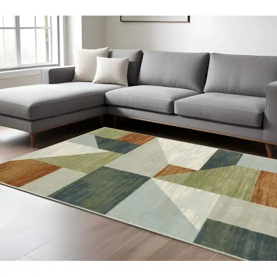 Grey Teal Blue Rust Green And Ivory Geometric Power Loom Stain Resistant Area Rug Photo 1