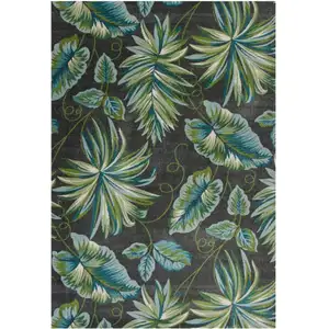Photo of Grey Teal Machine Woven Oversized Tropical Leaves Indoor Area Rug