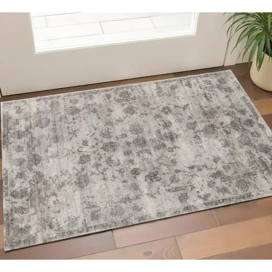 Beige And Blue Floral Medallion Hand Loomed Distressed Area Rug Photo 1