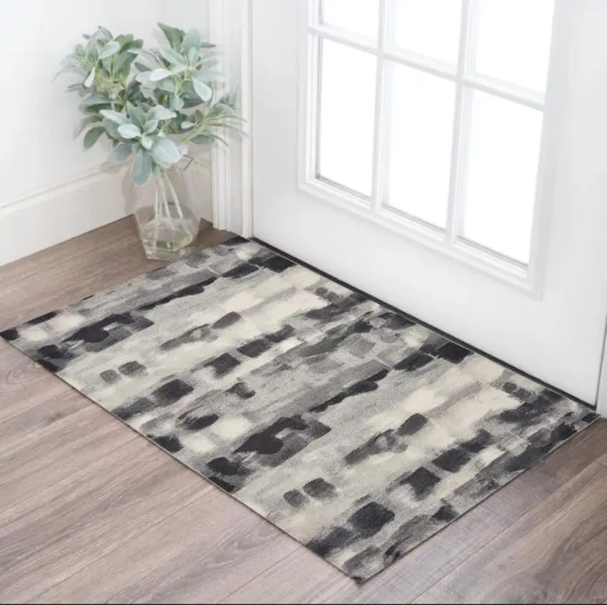 Gray Black And Ivory Abstract Area Rug Photo 1