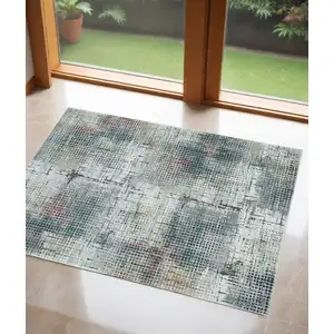 Photo of Grey or  Brick Polypropylene and  Polyester Rug
