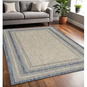 Photo of Grey or  Denim Bordered UV Treated Area Rug