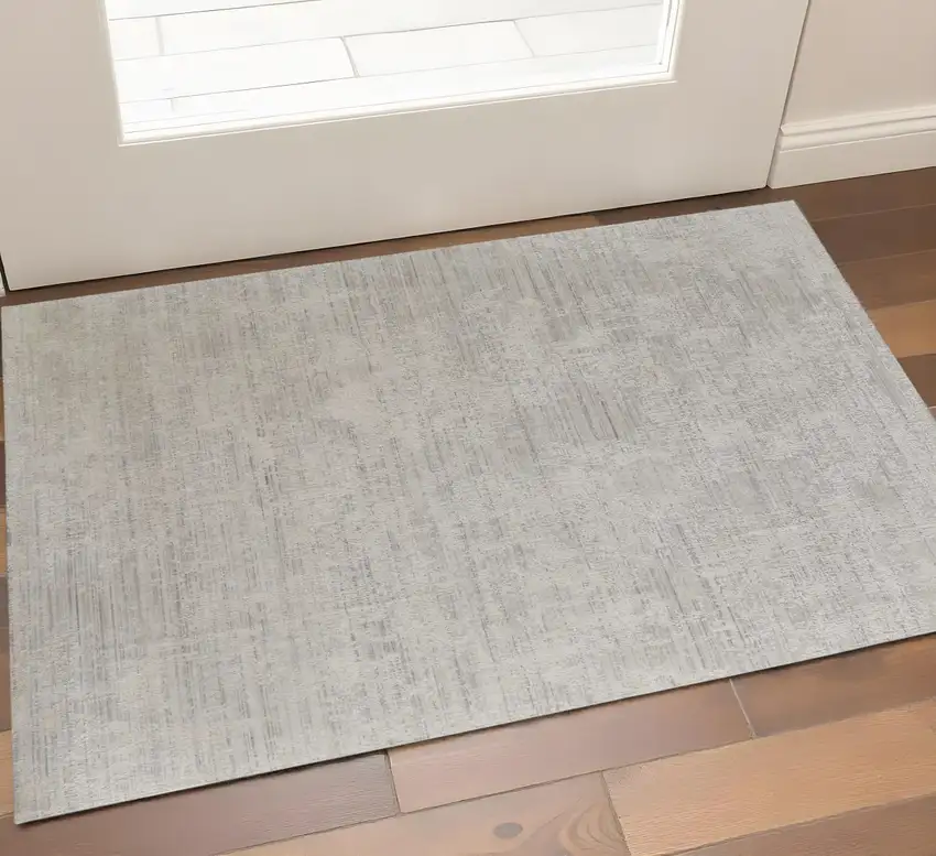 Gray And Ivory Abstract Hand Woven Distressed Area Rug Photo 1