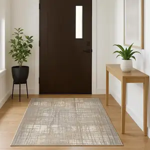 Photo of Ivory Abstract Power Loom Area Rug