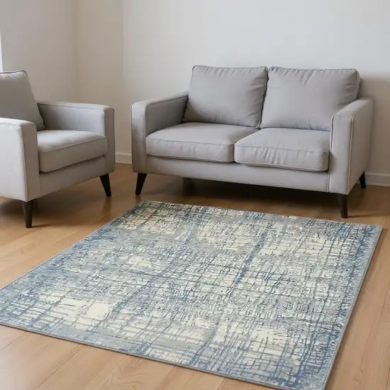 Ivory Abstract Power Loom Area Rug Photo 1