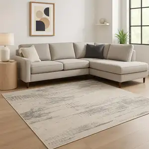 Photo of Ivory Abstract Power Loom Area Rug