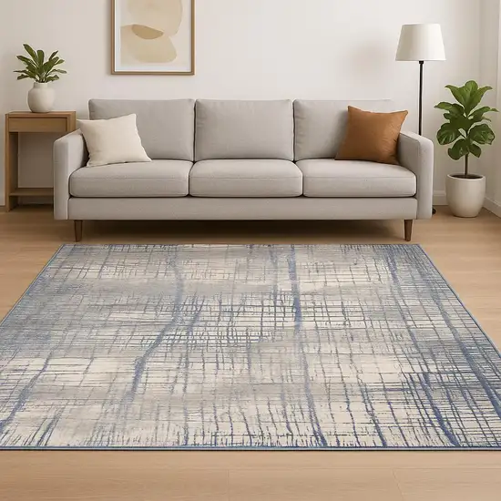 Ivory Abstract Power Loom Area Rug Photo 1