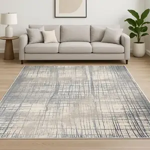 Photo of Ivory Abstract Power Loom Area Rug