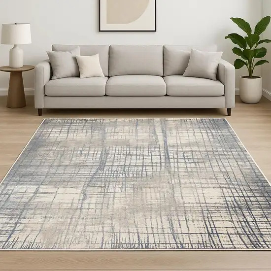 Ivory Abstract Power Loom Area Rug Photo 1
