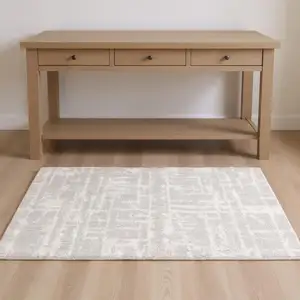 Photo of Ivory Abstract Shag Power Loom Area Rug