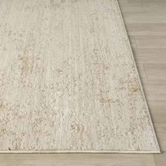 Ivory And Beige Abstract Area Rug Photo 4