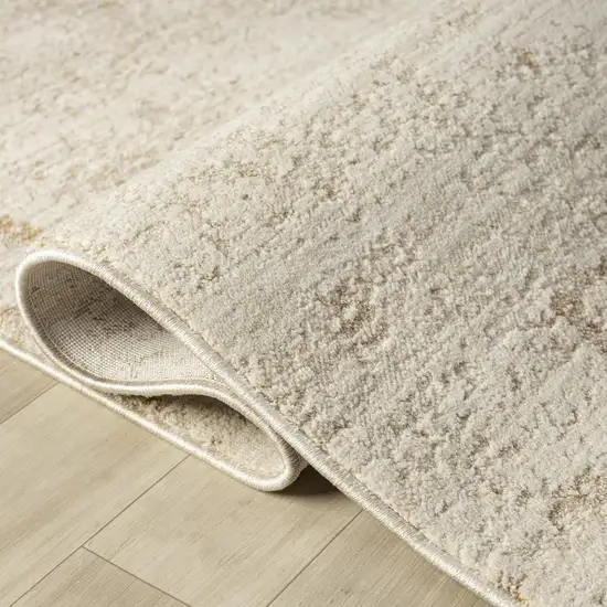 Ivory And Beige Abstract Area Rug Photo 3