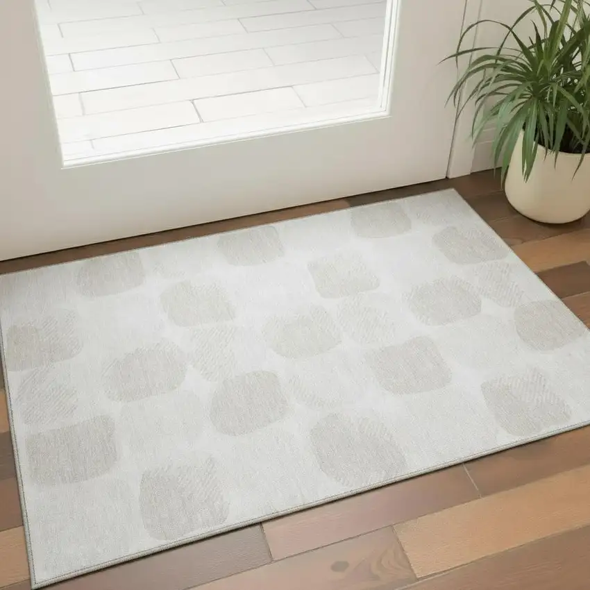 Ivory And Beige Abstract Geometric Washable Area Rug With UV Protection Photo 1