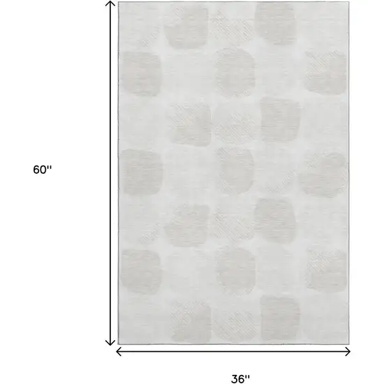 Ivory And Beige Abstract Geometric Washable Area Rug With UV Protection Photo 3