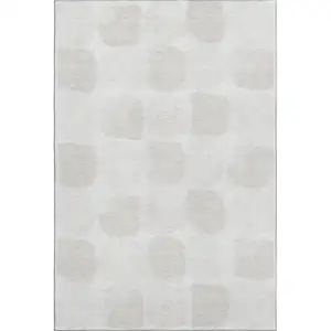 Photo of Ivory And Beige Abstract Geometric Washable Area Rug With UV Protection
