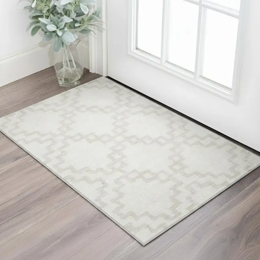 Ivory And Beige Abstract Geometric Washable Area Rug With UV Protection Photo 2