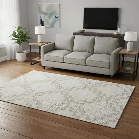 Ivory And Beige Abstract Geometric Washable Area Rug With UV Protection Photo 2
