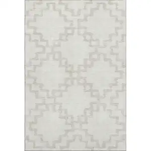 Photo of Ivory And Beige Abstract Geometric Washable Area Rug With UV Protection