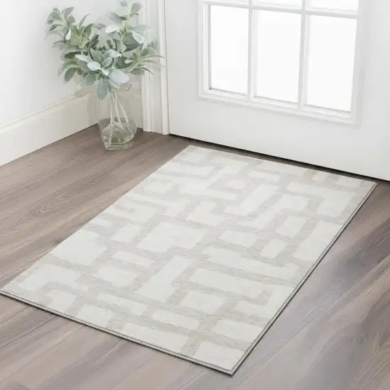Ivory And Beige Abstract Geometric Washable Area Rug With UV Protection Photo 2