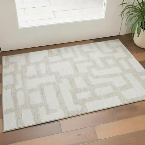 Ivory And Beige Abstract Geometric Washable Area Rug With UV Protection Photo 1