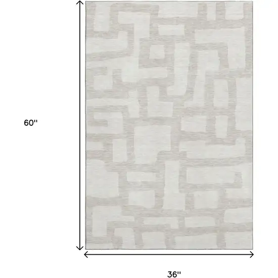 Ivory And Beige Abstract Geometric Washable Area Rug With UV Protection Photo 3