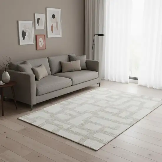 Ivory And Beige Abstract Geometric Washable Area Rug With UV Protection Photo 2