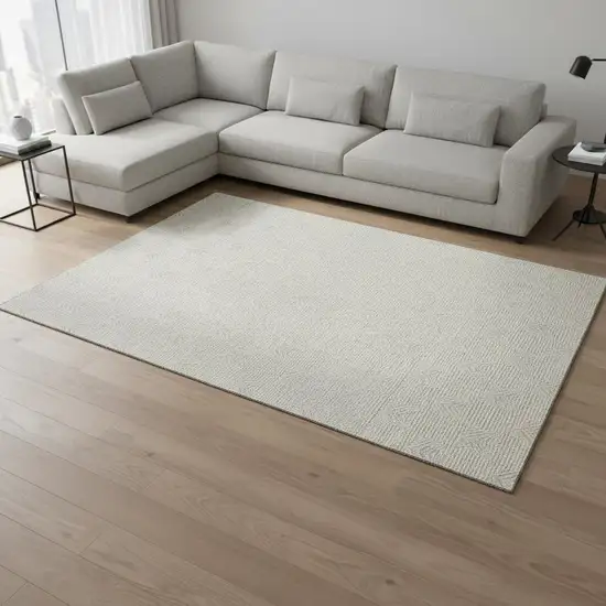 Ivory And Beige Abstract Geometric Washable Area Rug With UV Protection Photo 2