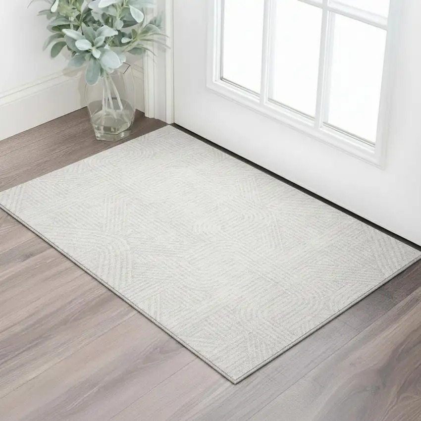 Ivory And Beige Abstract Geometric Washable Area Rug With UV Protection Photo 2