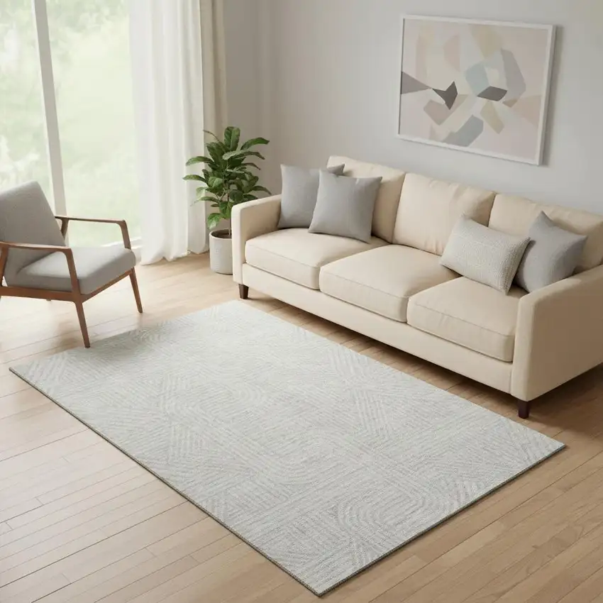 Ivory And Beige Abstract Geometric Washable Area Rug With UV Protection Photo 1