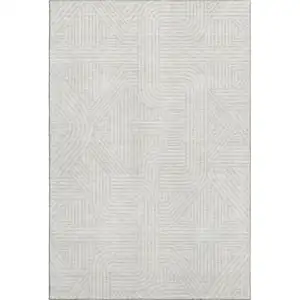 Photo of Ivory And Beige Abstract Geometric Washable Area Rug With UV Protection