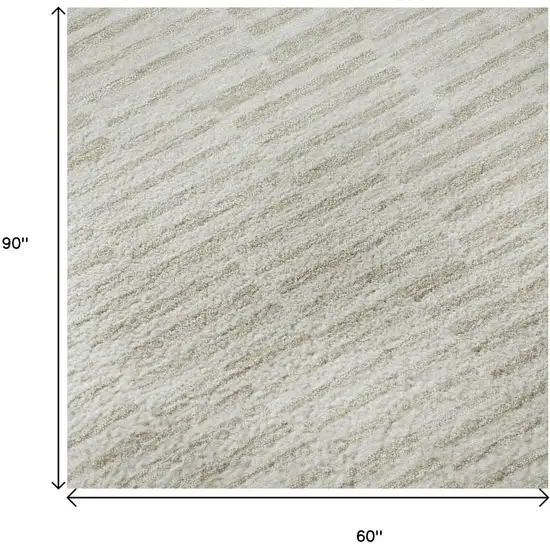 Ivory And Beige Abstract Geometric Washable Area Rug With UV Protection Photo 9