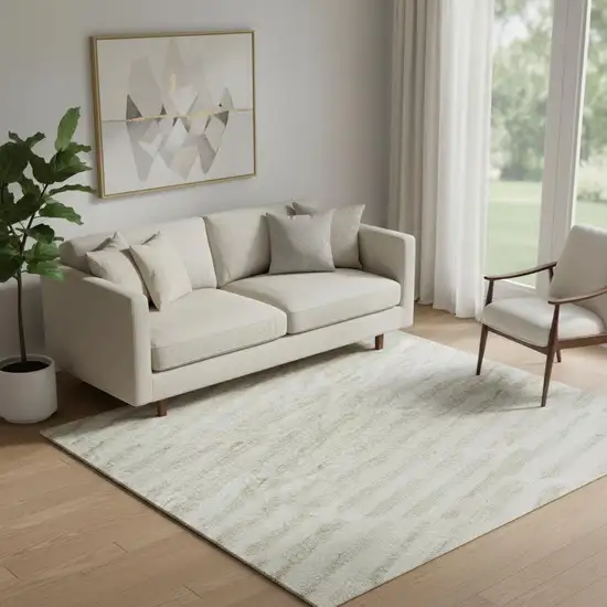 Ivory And Beige Abstract Geometric Washable Area Rug With UV Protection Photo 1