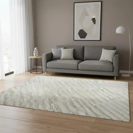 Ivory And Beige Abstract Geometric Washable Area Rug With UV Protection Photo 2