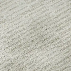 Photo of Ivory And Beige Abstract Geometric Washable Area Rug With UV Protection