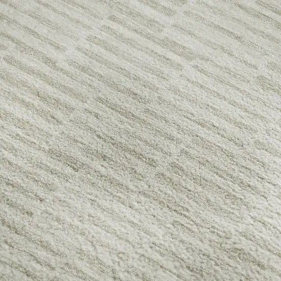 Ivory And Beige Abstract Geometric Washable Area Rug With UV Protection Photo 3