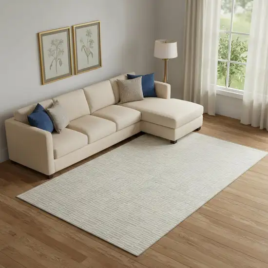 Ivory And Beige Abstract Geometric Washable Area Rug With UV Protection Photo 1