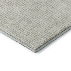 Photo of Ivory And Beige Abstract Geometric Washable Area Rug With UV Protection