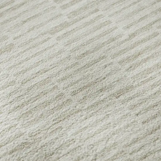 Ivory And Beige Abstract Geometric Washable Area Rug With UV Protection Photo 1