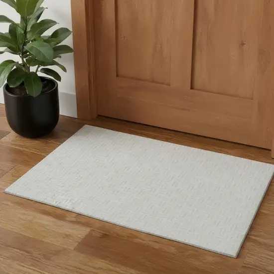 Ivory And Beige Abstract Geometric Washable Area Rug With UV Protection Photo 1