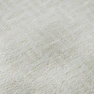 Photo of Ivory And Beige Abstract Geometric Washable Area Rug With UV Protection