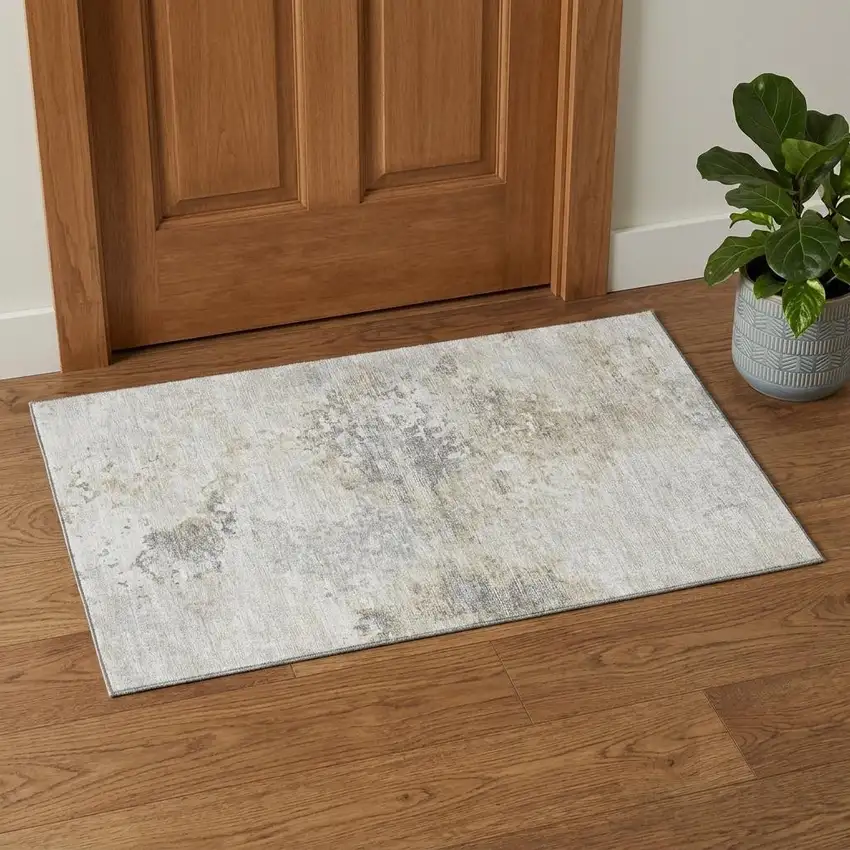 Ivory And Beige Abstract Washable Area Rug With UV Protection Photo 1