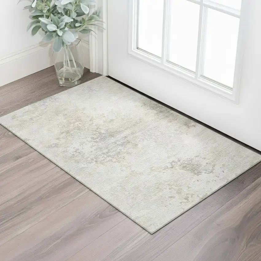 Ivory And Beige Abstract Washable Area Rug With UV Protection Photo 1