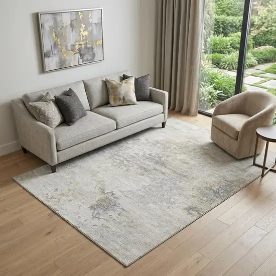 Ivory And Beige Abstract Washable Area Rug With UV Protection Photo 1