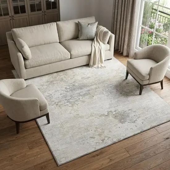 Ivory And Beige Abstract Washable Area Rug With UV Protection Photo 1