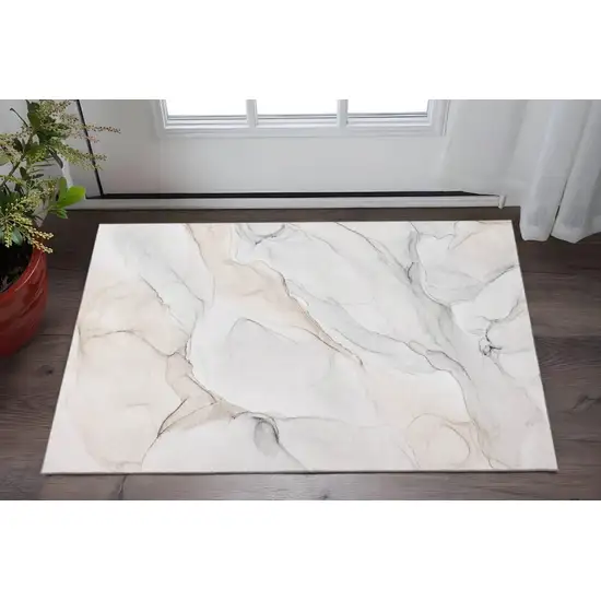 Ivory And Beige Abstract Washable Area Rug With UV Protection Photo 2