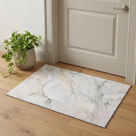 Ivory And Beige Abstract Washable Area Rug With UV Protection Photo 1