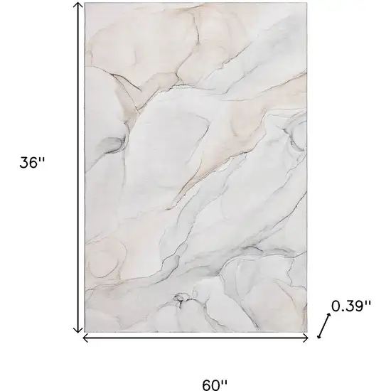 Ivory And Beige Abstract Washable Area Rug With UV Protection Photo 3