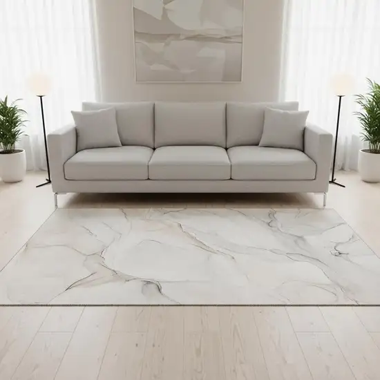 Ivory And Beige Abstract Washable Area Rug With UV Protection Photo 1